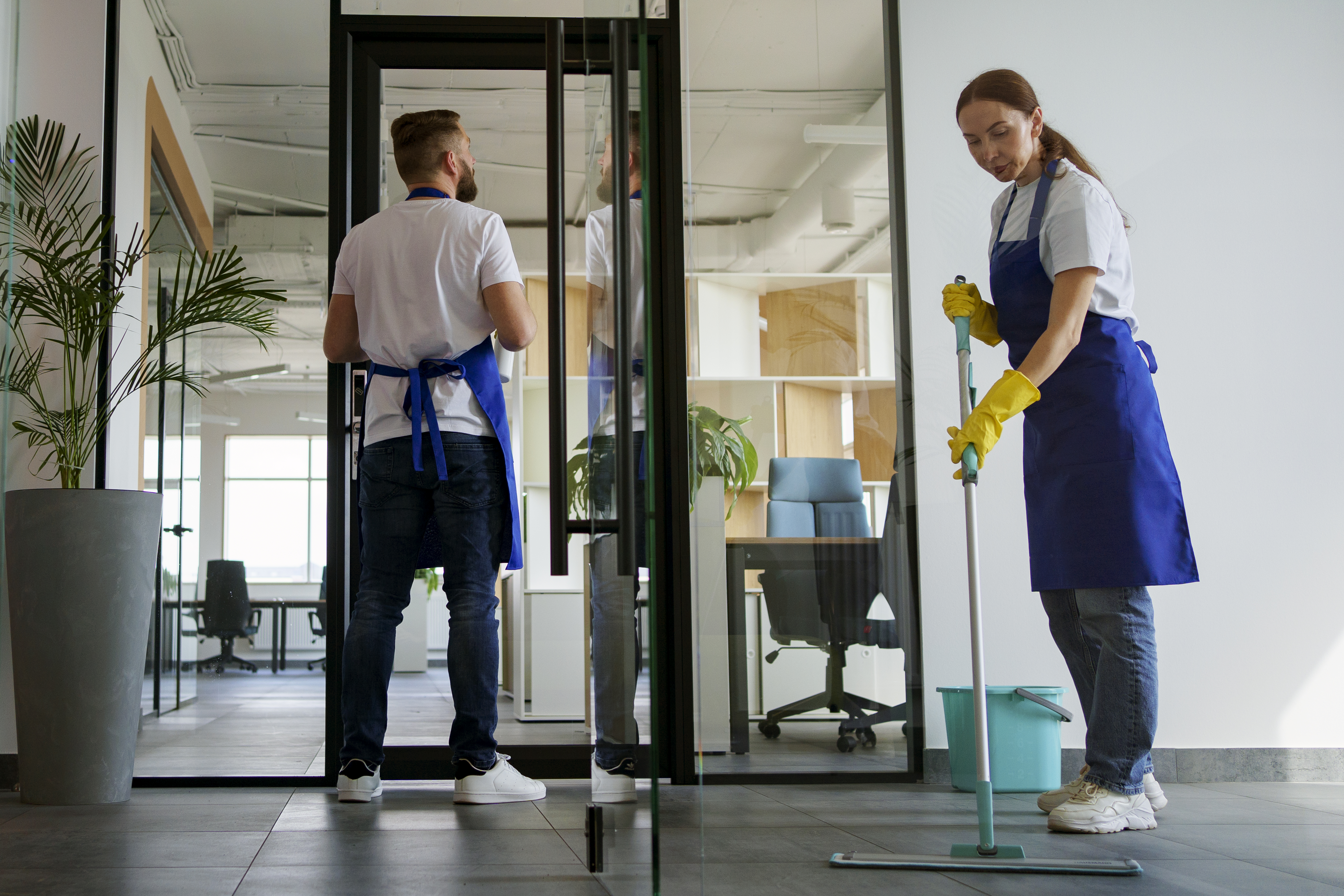 Office cleaning professionals at work
